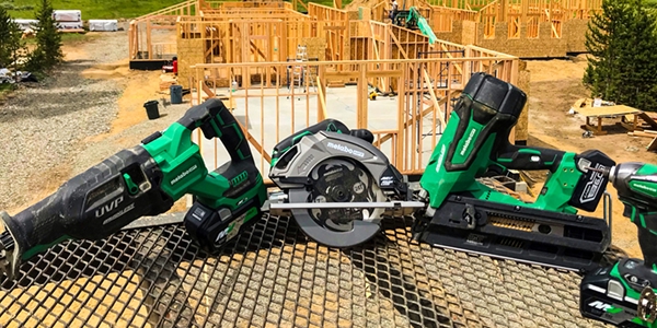 Group of construction tools on metal table.