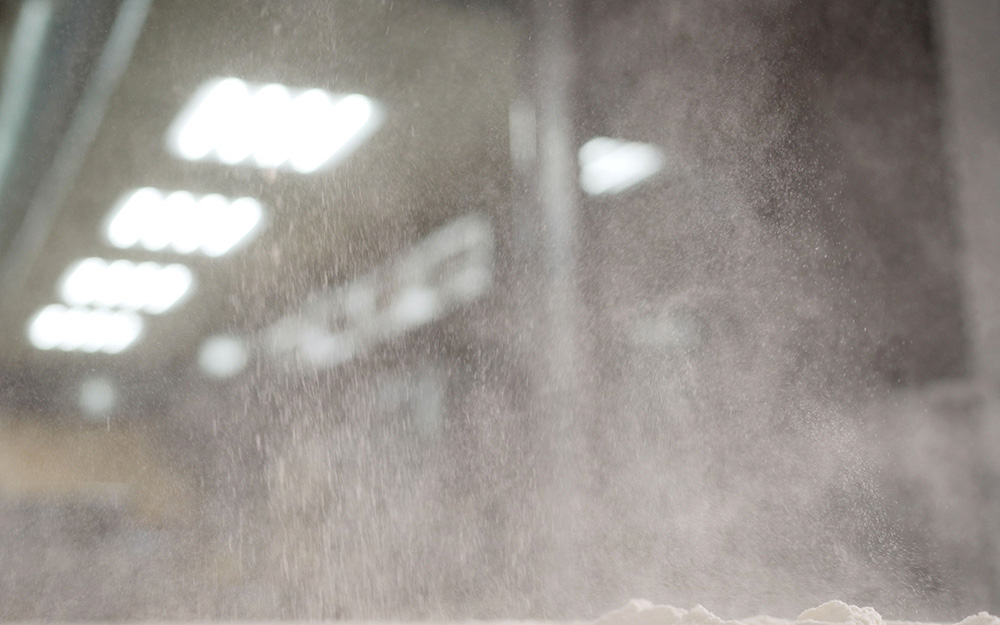 Dust particles in the air inside a factory.