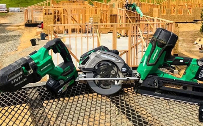 Group of construction tools on metal table.